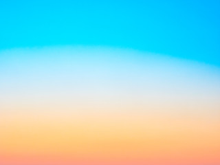 Abstract blurred blue, yellow and orange background. Summer concept