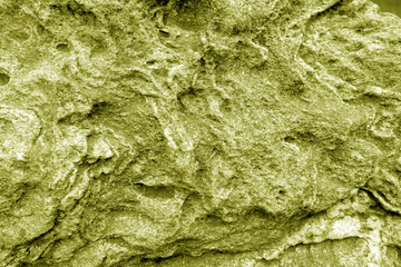 Old stone surface in yellow tone.
