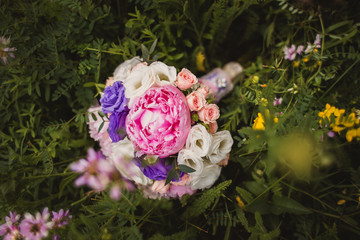 Wedding bouquet in green grass