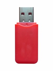 Top view of red plastic USB flash drive isolated on white