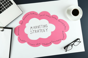 Digital marketing strategies concept. Hand written marketing plan. Close up, copy space, top view, flat lay, background.