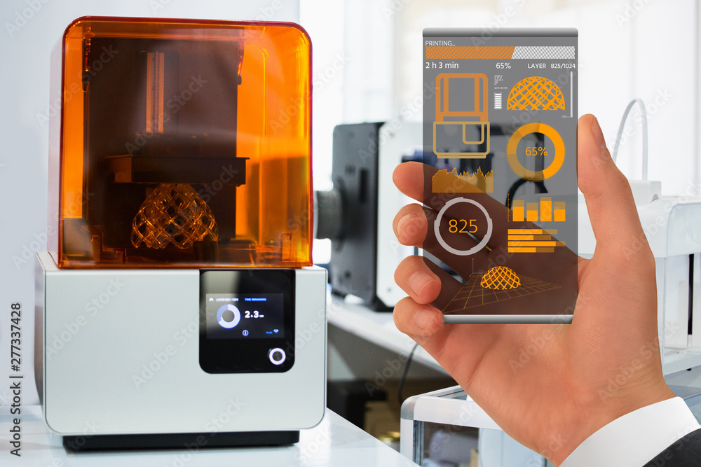Poster hand with futuristic transparent smartphone. application for control 3d printer in the laboratory.