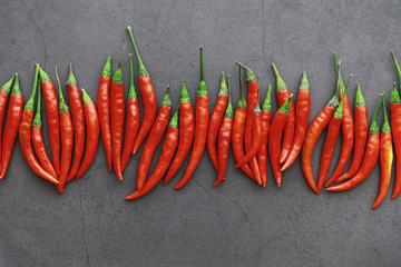 Hot red pepper. Chilean pepper on a black.