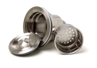 closeup of kitchen drain assembly on white background