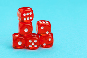 Gaming dices on blue background. Game concept.