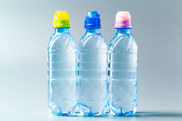 Mineral pure water bottles. Healthy living concept