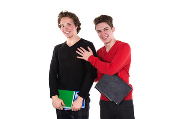 Two fun attractive students. White background. Study.