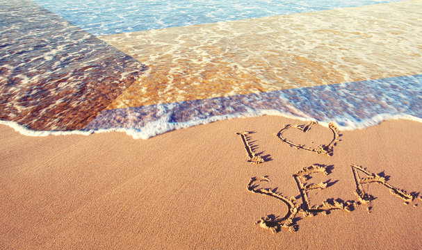 Beach sand, sea and flag Bahamas islands. I love Bahamas concept - Powered by Adobe