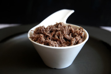 Boiled chopped meat  on white plate