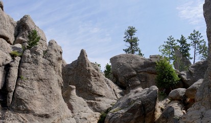 Upward close up shot of impressive granite rock formations along Needles Highway in South Dakota.