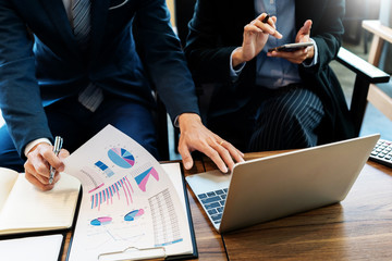 business people and coworker colleagues discussing explanations about week working plan project cooperating in modern coworking office.