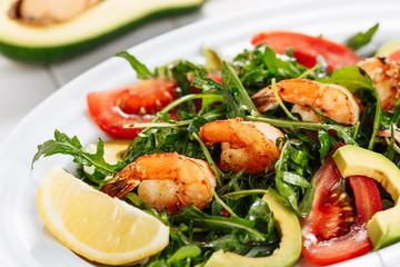 Shrimp Salad With Avocado Garden Rocket Leaves. Fresh Prawn Vegetable Appetizer Tasty Organic Aragula Seafood Vegetarian Dish. Diet Gourmet Low-fat Restaurant Menu Dinner Plate Close-up Flat Lay