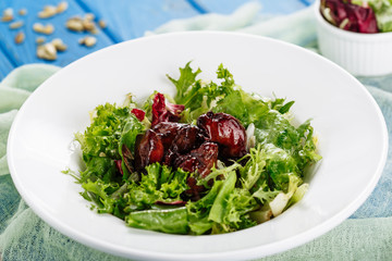 Juicy Fried Liver Fresh Iceberg Lettuce Salad. Delicious Roast Specialty Meat Portion Greenery Appetizer European Restaurant Menu. Delightful Cuisine Dinner Plate Table Background Flat Lay Closeup