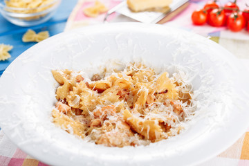 Delicious Creamy Pesto Farfalle Pasta Healthy Food. Nutritious Macaroni Meal Grated Cheese Shavings Gourmet Restaurant Dish. Delightful Italian Cuisine Dinner Bowl Table Background Flat Lay Close-up