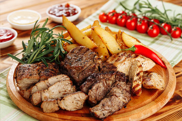 Grilled Pork Tenderloin Steak Roast Potato Platter. Juicy Fried Beef Loin Chop Gourmet Meal Rosemary Bunch Spicy Pepper. Delicious Dish Cranberry Sauce Wooden Board Healthy Food Closeup Flat Lay
