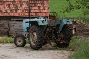Tractor and house on the mountain