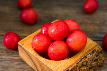 Red plum. Healthy diet. Rustic style