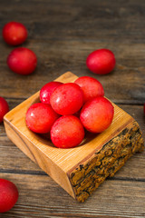Red plum. Healthy diet. Rustic style