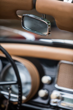 Rear view mirror of a vintage car