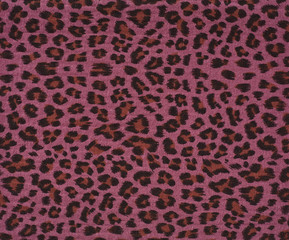 Cotton fabric with animal print. Animal pattern background or texture. Texture leopard.