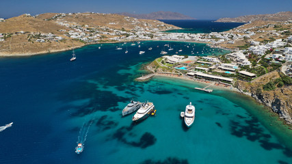 Aerial drone photo of paradise celebrity bay of Ornos famous for pool resorts and sandy turquoise...