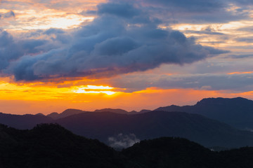 Mountain view on the morning with sea of fog and sunrise light.