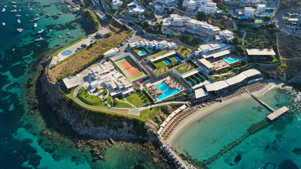 Aerial drone photo of paradise celebrity bay of Ornos famous for pool resorts and sandy turquoise...
