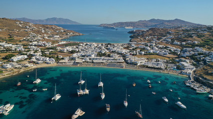 Aerial drone photo of paradise celebrity bay of Ornos famous for pool resorts and sandy turquoise...