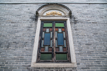 Colorful patterned glass windows of the ancient buildings of Zumiaoling, Foshan, Guangdong, China