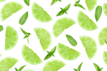 Mojito cocktail - pattern of lime and mint leaves on a white isolated background.