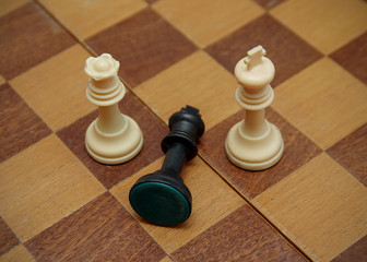 Chess pieces on a chessboard. Game of chess.