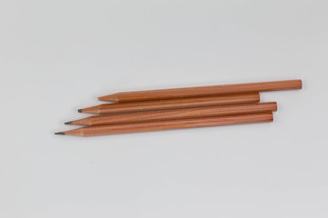 Multiple pencils on a white background