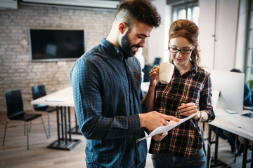 Portrait of architects having discussion in office