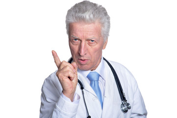 Adult doctor in white pointing on white background