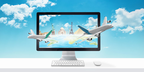 Planes flying out of the computer display. Concept of booking holiday and planning a trip online.