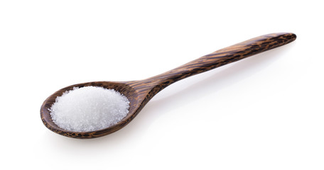 sugar in wooden spoon on white background