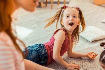 Happy excited girl being in a good mood