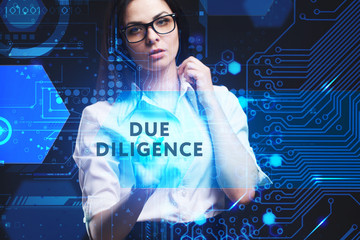 The concept of business, technology, the Internet and the network. A young entrepreneur working on a virtual screen of the future and sees the inscription: Due diligence