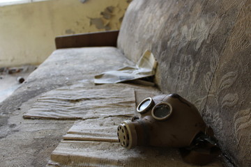 Gas mask in school in deserted Masheve settlement, Chernobyl Exclusion Zone, Ukraine