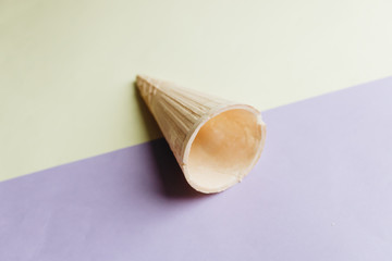 Composition of waffle cones on light background