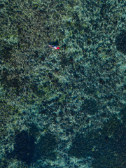 Fototapeta na wymiar Aerial view of surfer