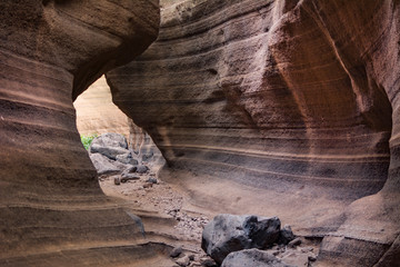 Inside a ravine and reddish stone caves