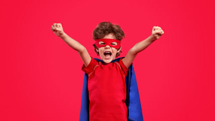 Little superhero screaming in excitement © kegfire