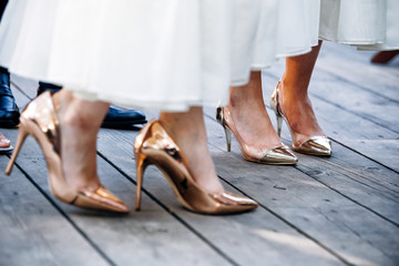 wedding dancing feet on heels of bridesmaid