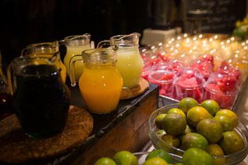 fresh fruit and juce on a fruit stand