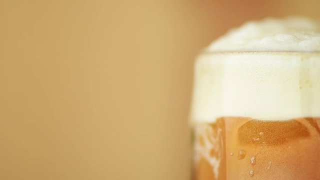 Beer head and bibbles in slow motion