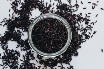 Pile of raw black rice, macro