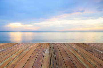 Naklejka na ściany i meble Empty wooden pier on calm sea morning background