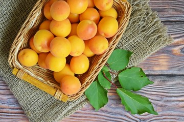 Ripe,sweet apricots on a wooden background.Healthy fruit.