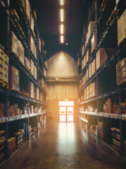 Fototapeta premium shelf in modern distribution warehouse or storehouse, industrial warehouse interior aisle